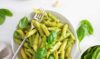 Pasta with vibrant green sauce: a fresh and flavorful dish bursting with herbs and natural goodness.