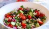 Delicious breakfast salad with olives and cheese, packed with fresh vegetables and a tangy vinaigrette dressing.