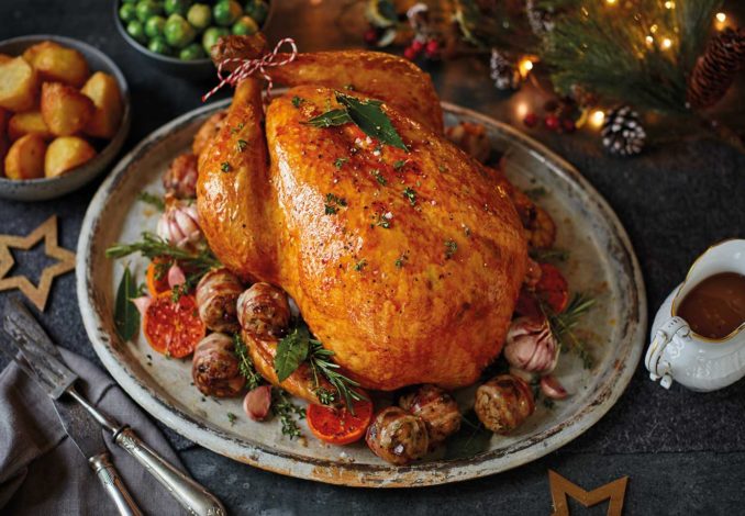 Roast turkey with delectable chestnut stuffing: a succulent and festive centerpiece for special occasions.