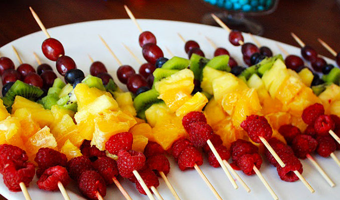 Colorful fruit skewers: a healthy and visually appealing assortment of fresh fruits on skewers